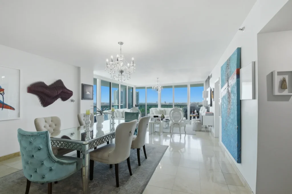 Luxury condo at Bristol Tower in Brickell showing the dining and living rooms with a view. Photo by Golden Pixxel Media.