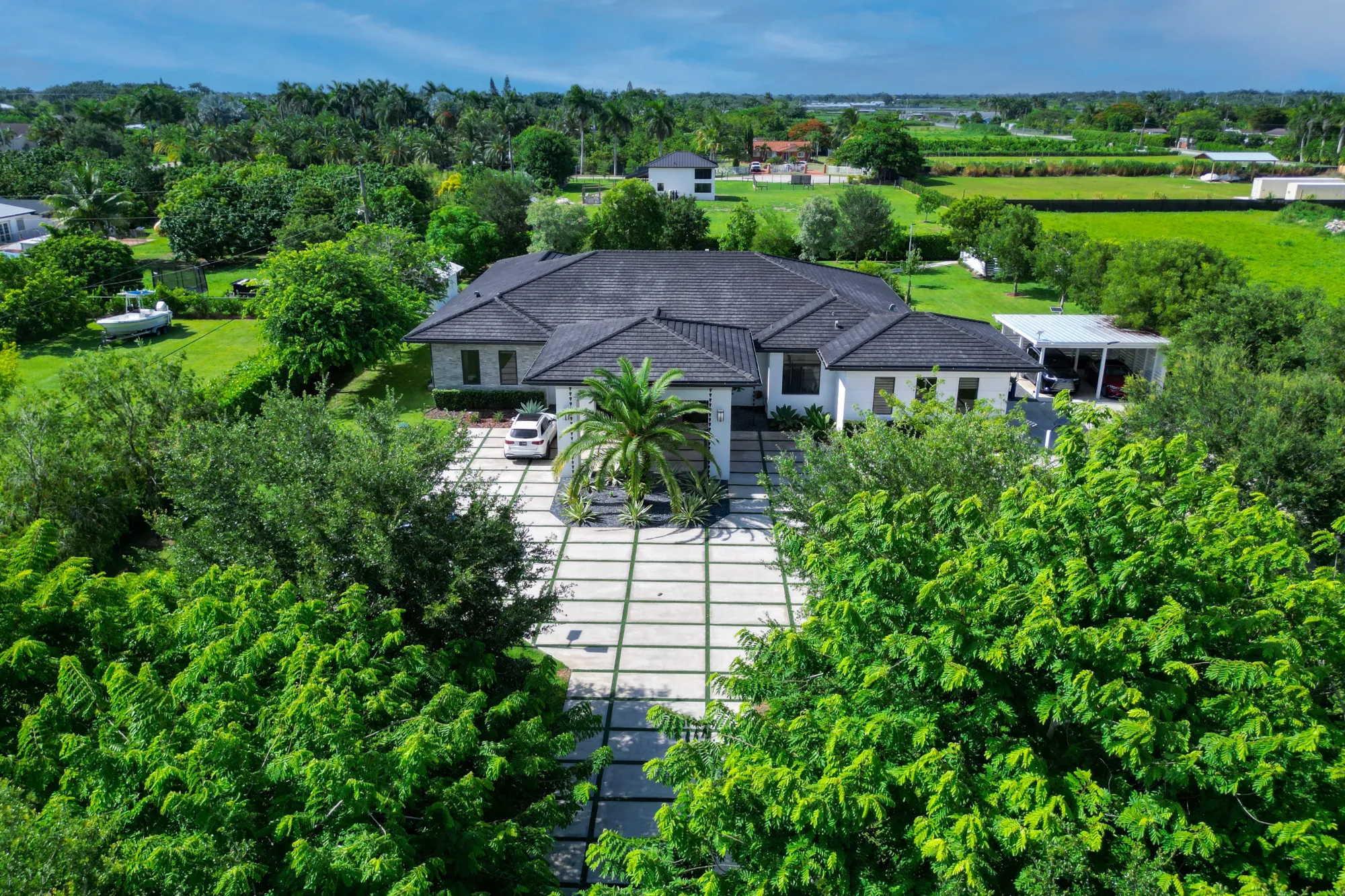 Aerial real estate drone photo of a luxury estate in Homestead, FL. Drone photographer Golden Pixxel Media.